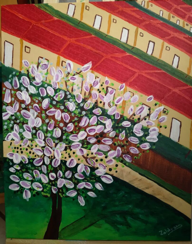 Un brin de nature : peinture d’un arbre aux fleurs blanches devant des rangées de maisons mitoyennes aux tuiles rouges